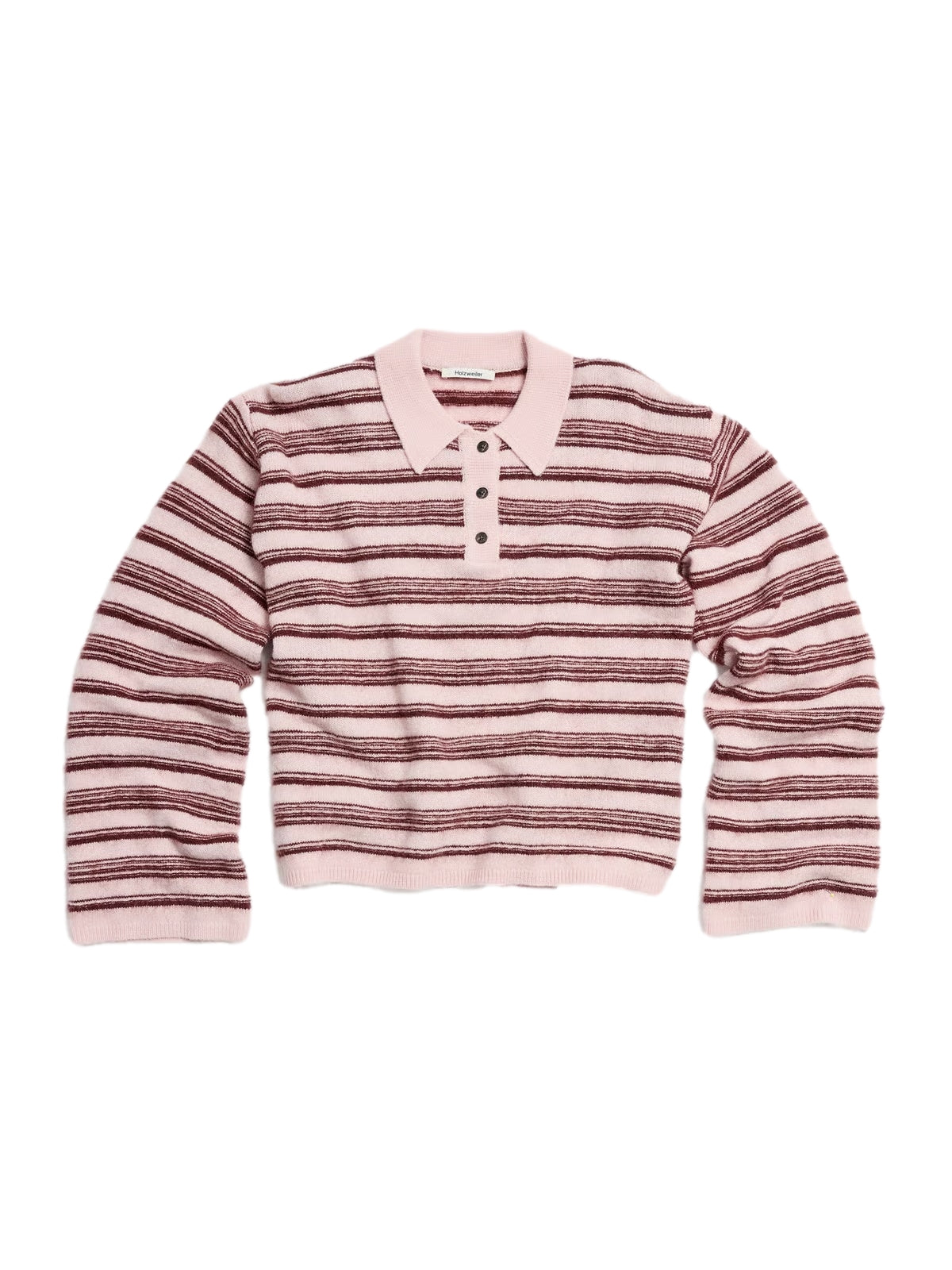 Holzweiler Olivia ullpolo i rosa med mønster, vises på denne bilde av en stilfull genser for kvinner.