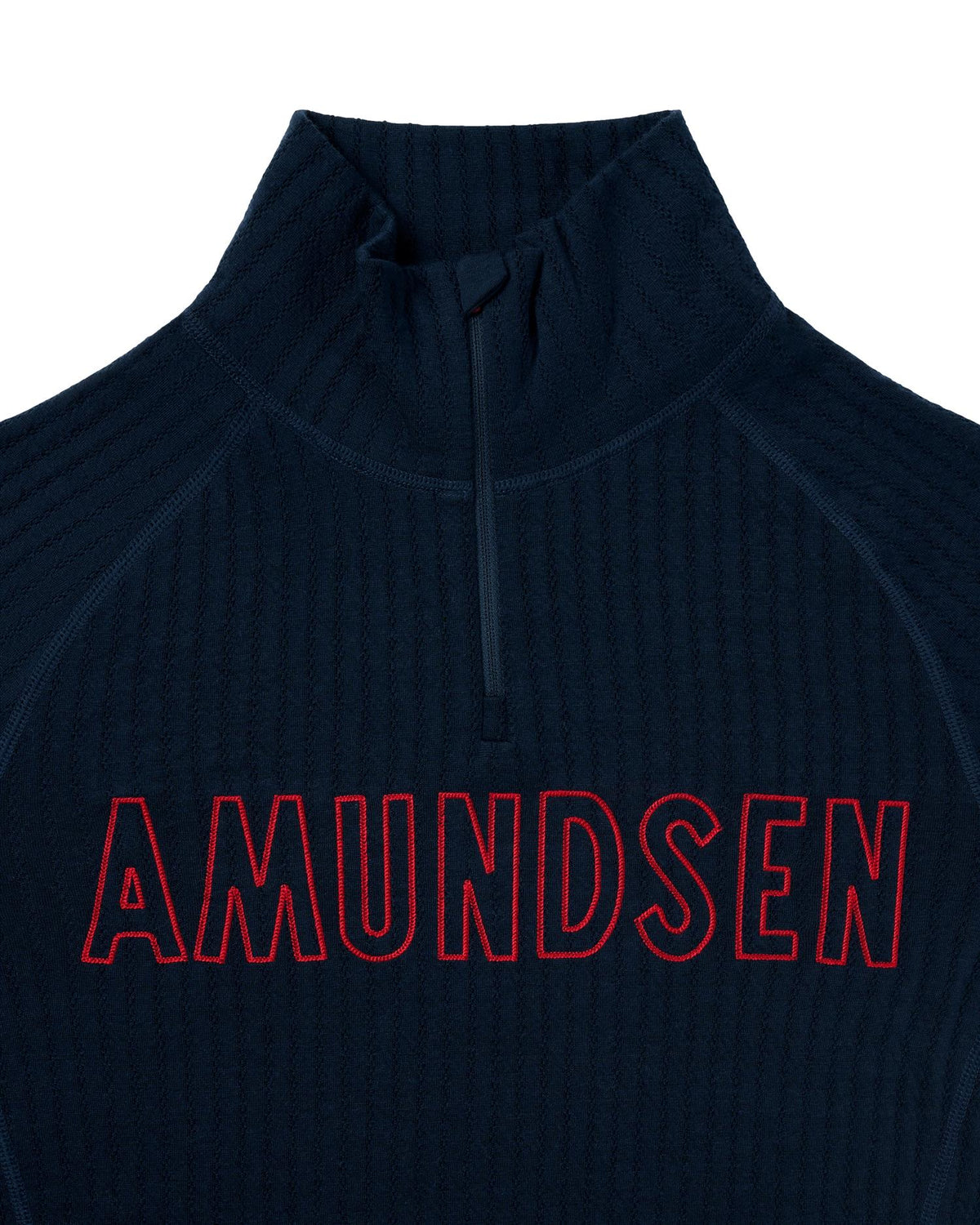 Amundsen Hero's Hide halv-zip ullundertøy for menn i mørkeblå, mykt og varmt med glidelås foran.