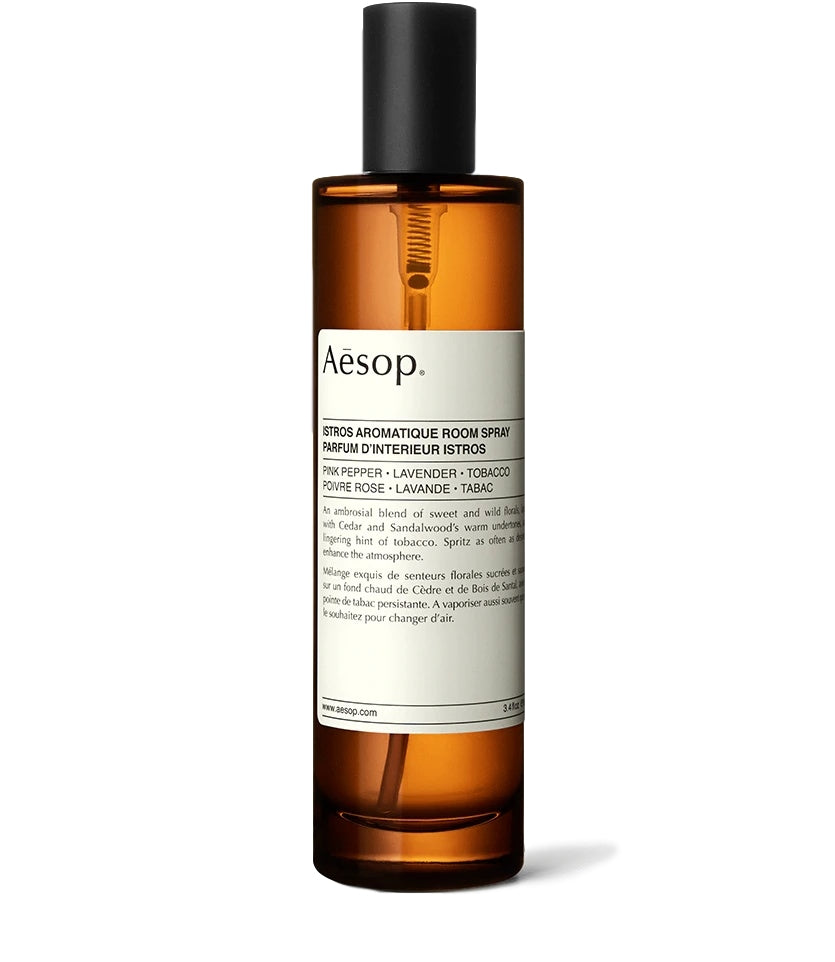 Aesop Istros aromatisk romspray i gjennomsiktig flaske, 100 ml, med elegant design og sprøytesystem.