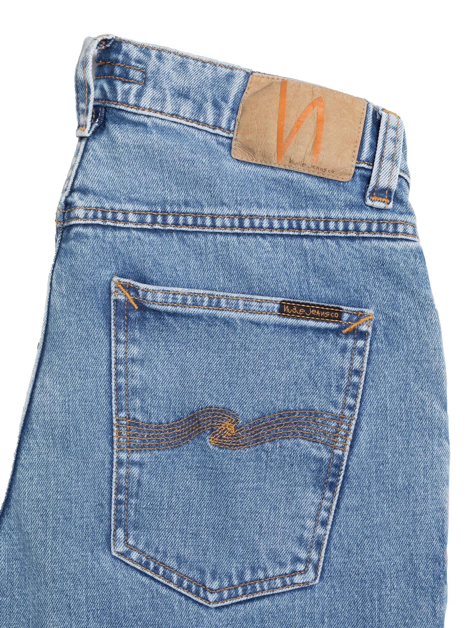 Nudie Jeans Solid Ollie Worn Vintage jeans i blå, slitne og rustikke denimbukser med vintage utseende.