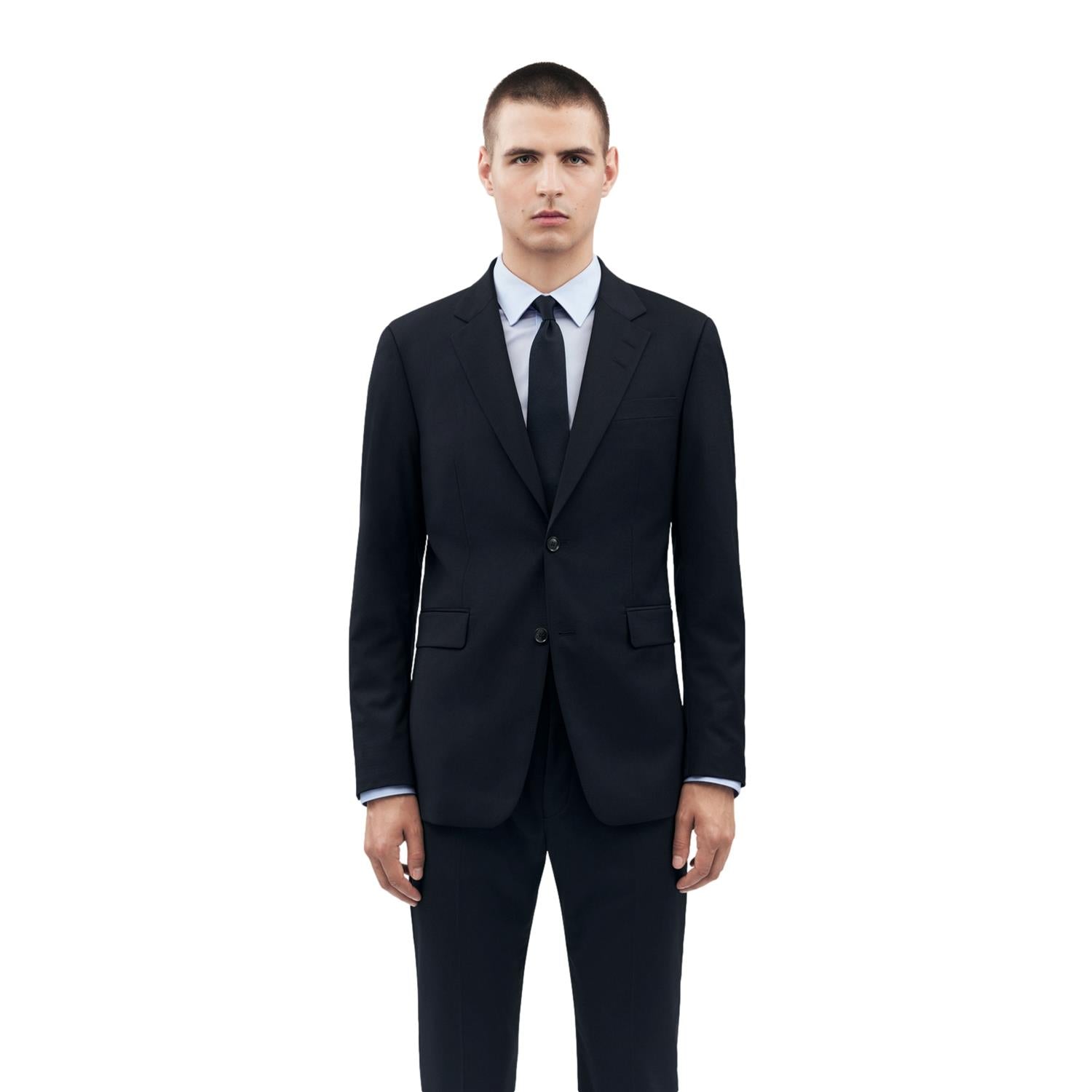 Tiger of Sweden Justins reise blazer dressjakke i marinefarge, med klassisk passform og elegant design.
