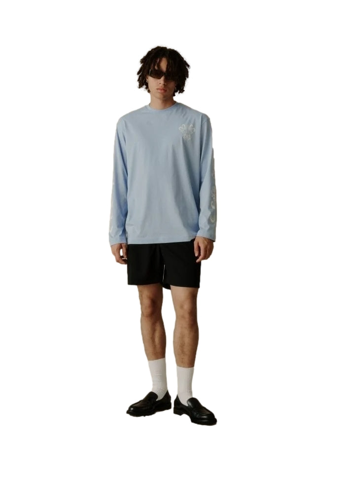 Sort Libertine Libertine Uptown Shorts liggende på en flat overflate, fokus på shorts med lommer og elastisk midje.