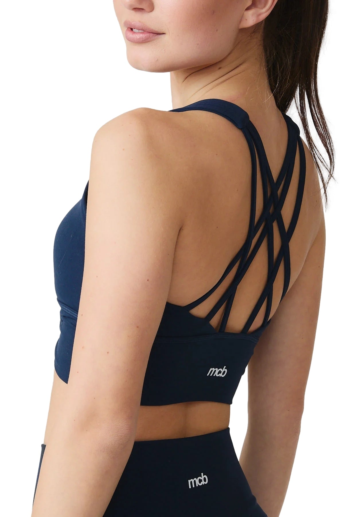 Mørkeblå MCB Sportswear strap bra topp med tynne skulderstropper, sporty og komfortabelt design for trening og aktivitet.