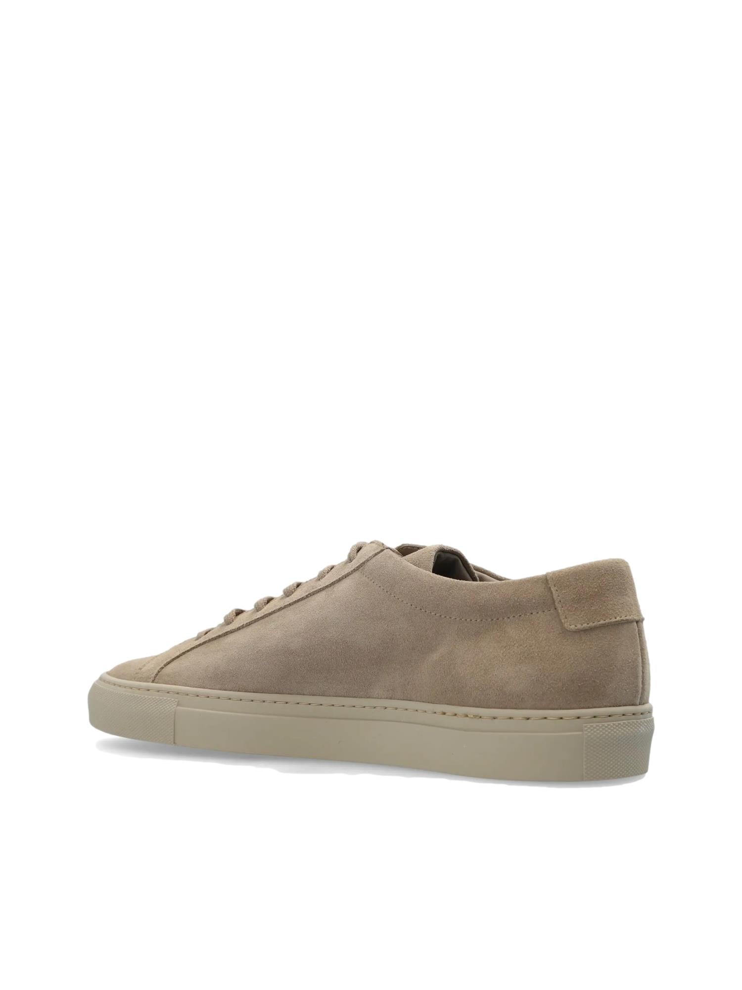 Common Projects Achilles Low Tonal brune sko, nærbilde av stilren, lav profil skodesign i lærmateriale.