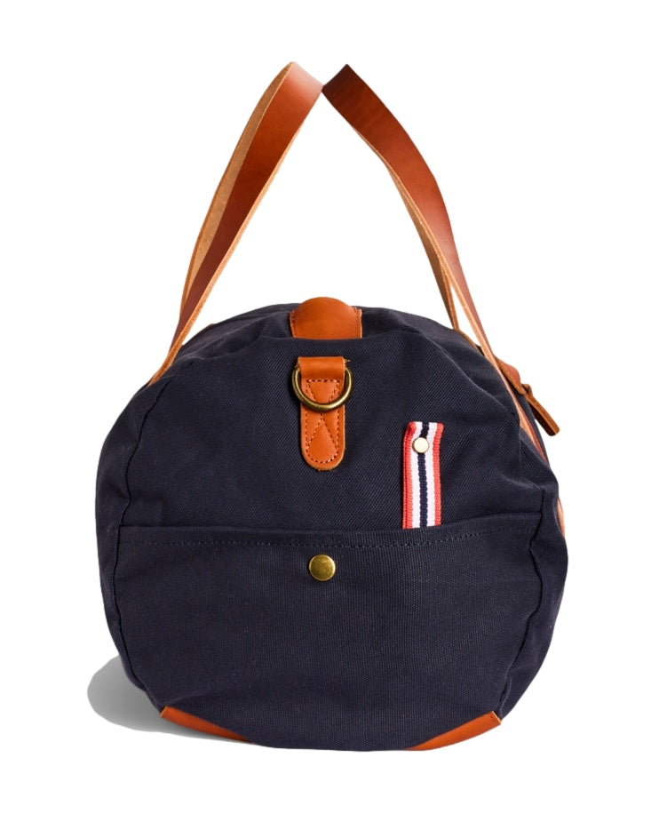 Amundsen Okavanga tote bag i navy, 35L, myk og slitesterk med romslig design, perfekt for reise og daglig bruk