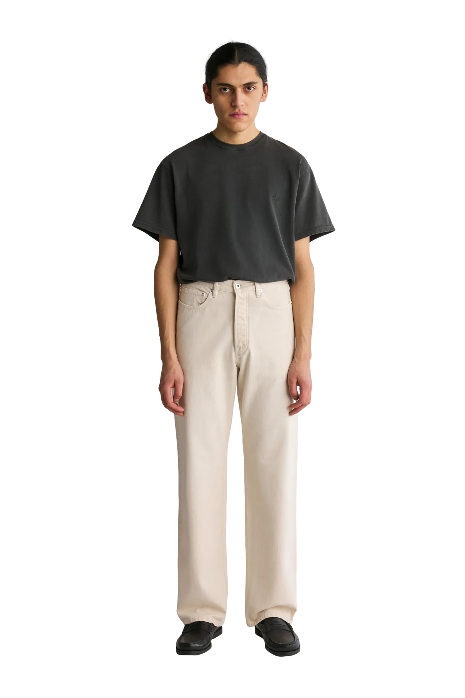 Livid Barnes Fade Bone jeans i off-white med slitte detaljer, vises på bildet. Moderne og stilige denim for menn.