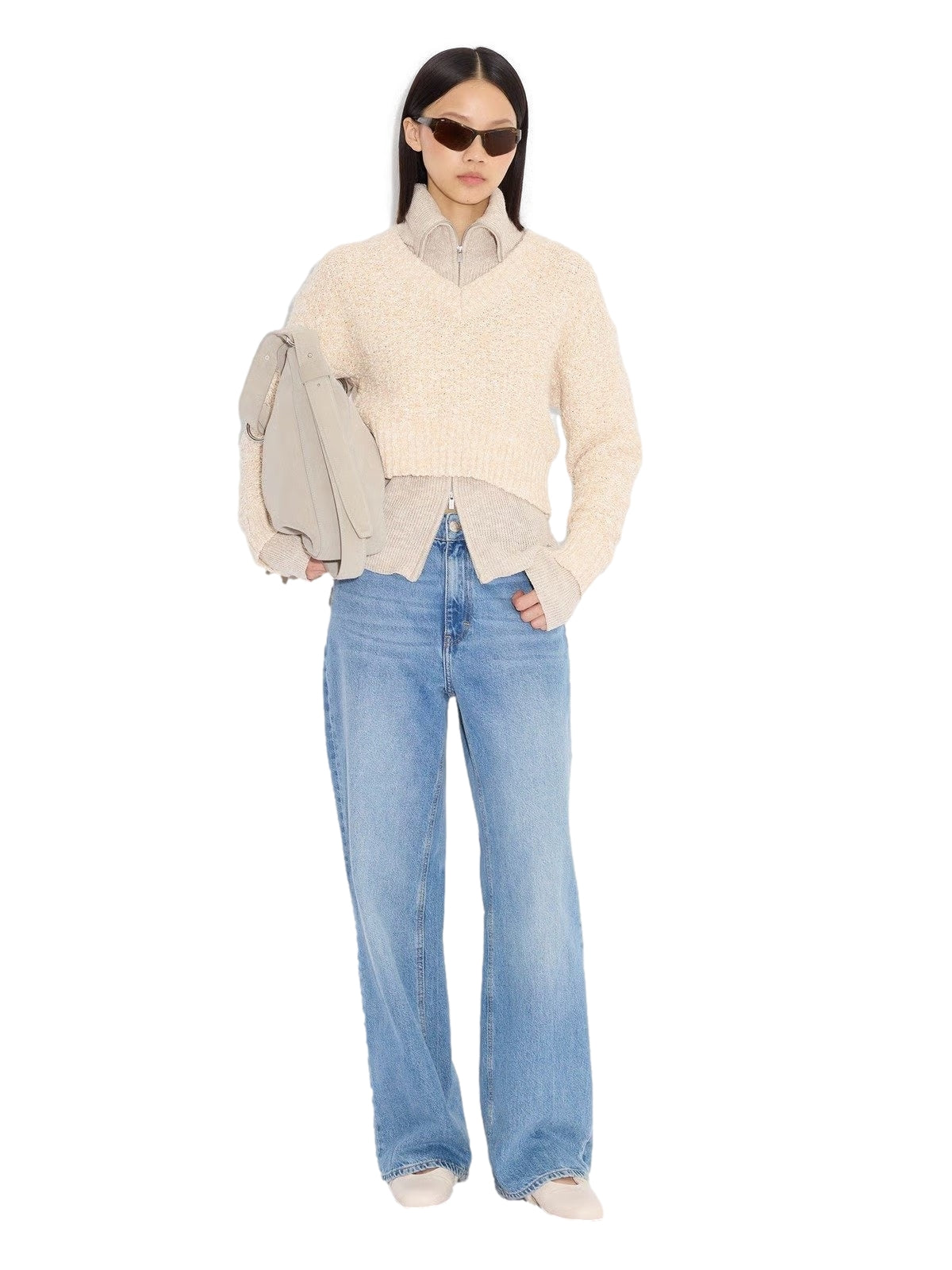 Lyseblå Holzweiler W Wide-Leg jeans, type jeans, med løs passform og høy midje, vist på modell.