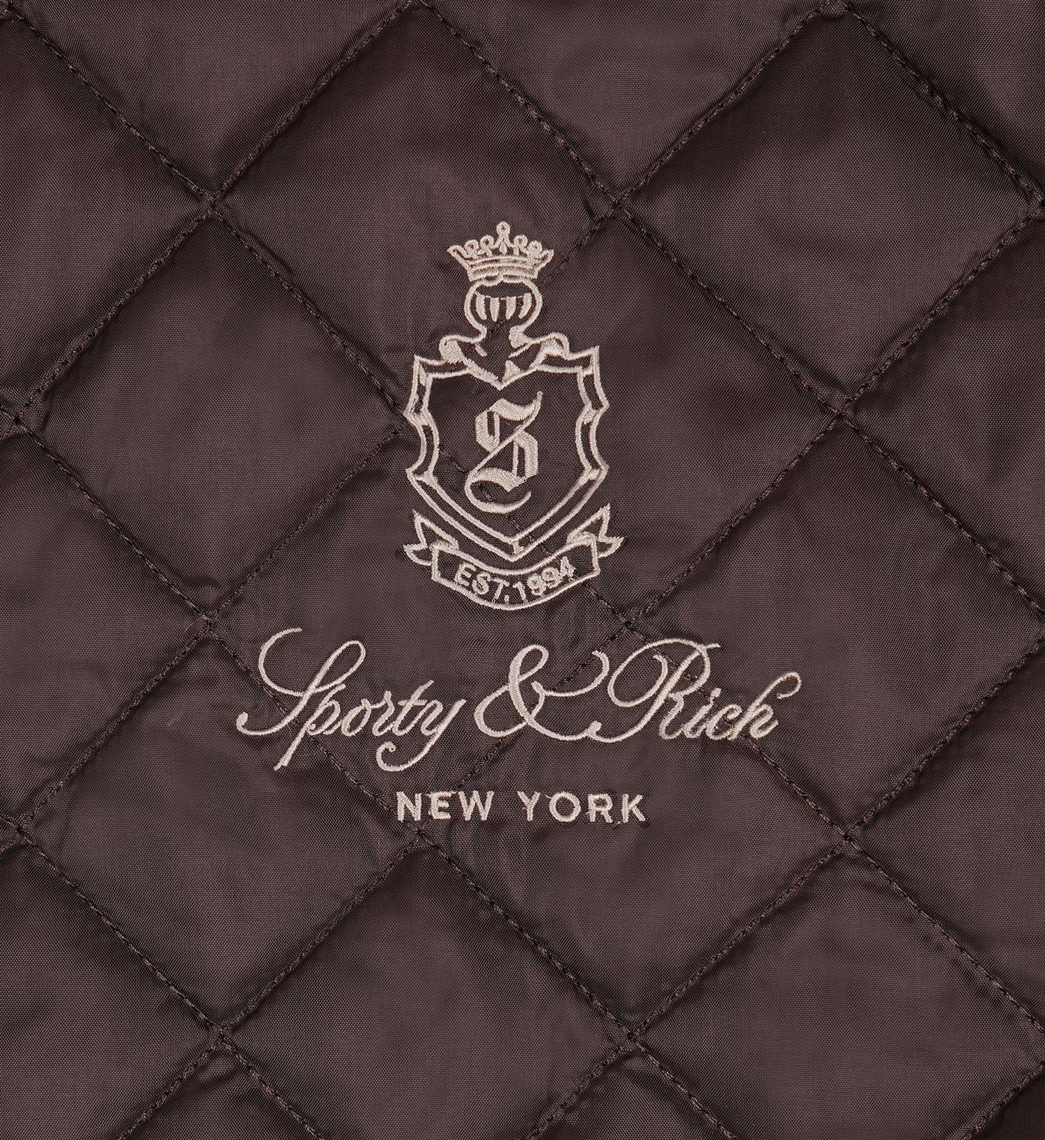 Sporty & Rich Venedom quilted riding vest Vest Brun - modostore.no