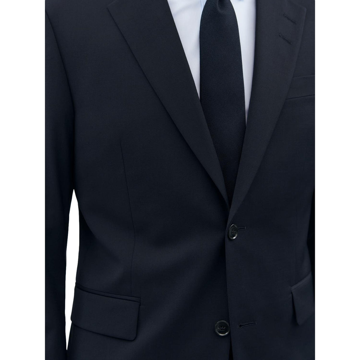 Marine blå Tiger of Sweden Justins Travel Suit dressjakke, elegant blazer med fin passform og detaljer foran.