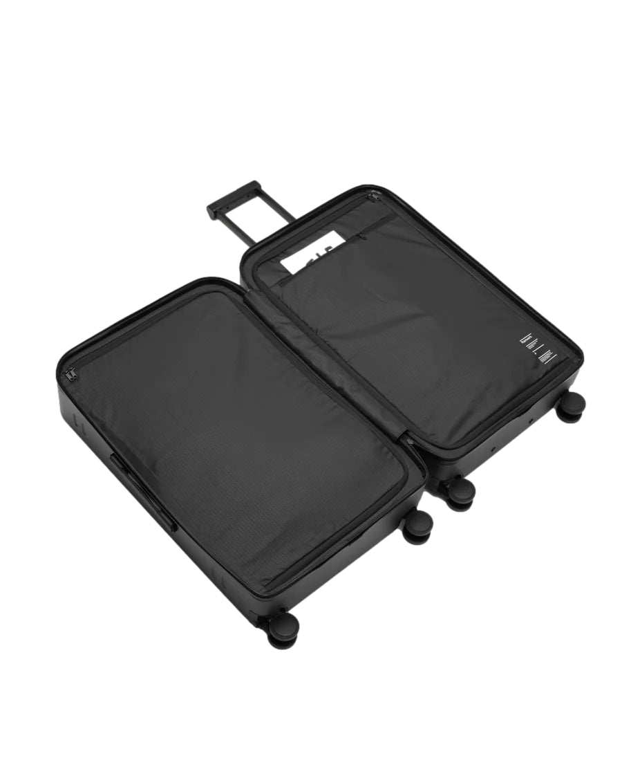 Douchebags Ramverk Check-In Luggage Large Koffert Sort - modostore.no