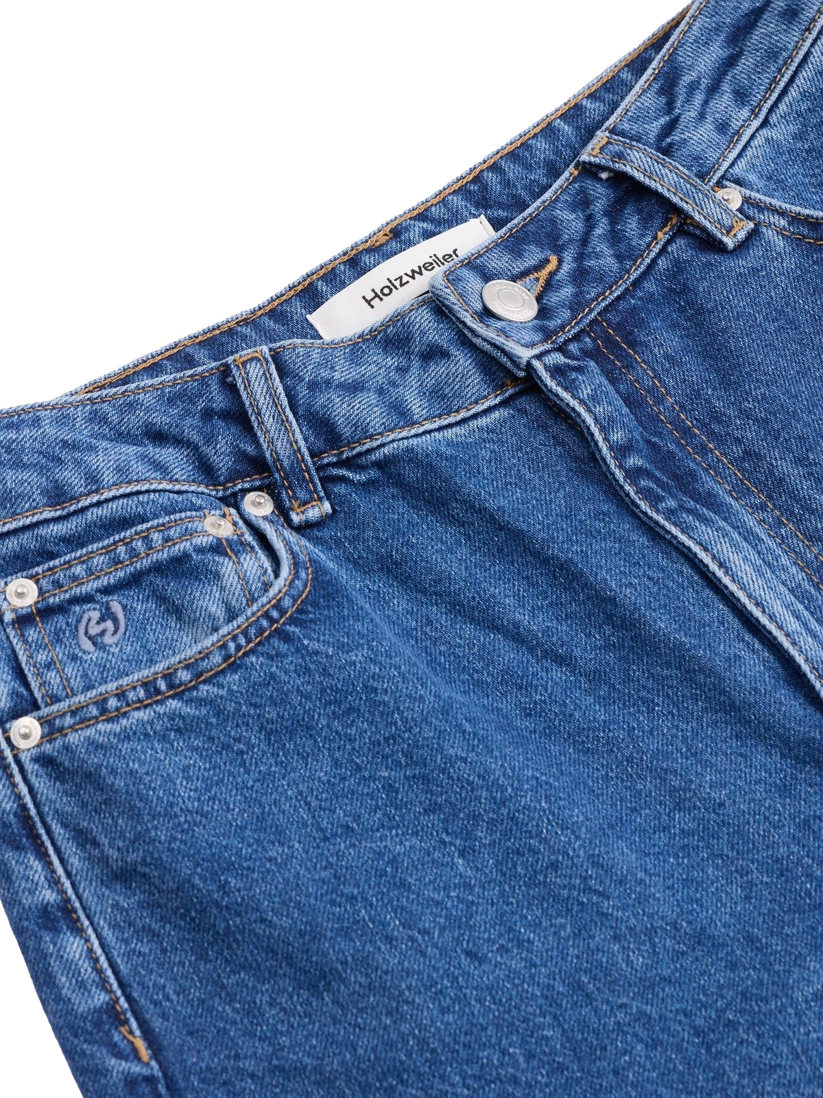 Holzweiler W Wide-Leg jeans i denimstoff, vises med høyt liv og vide ben, i klassisk blå denim.