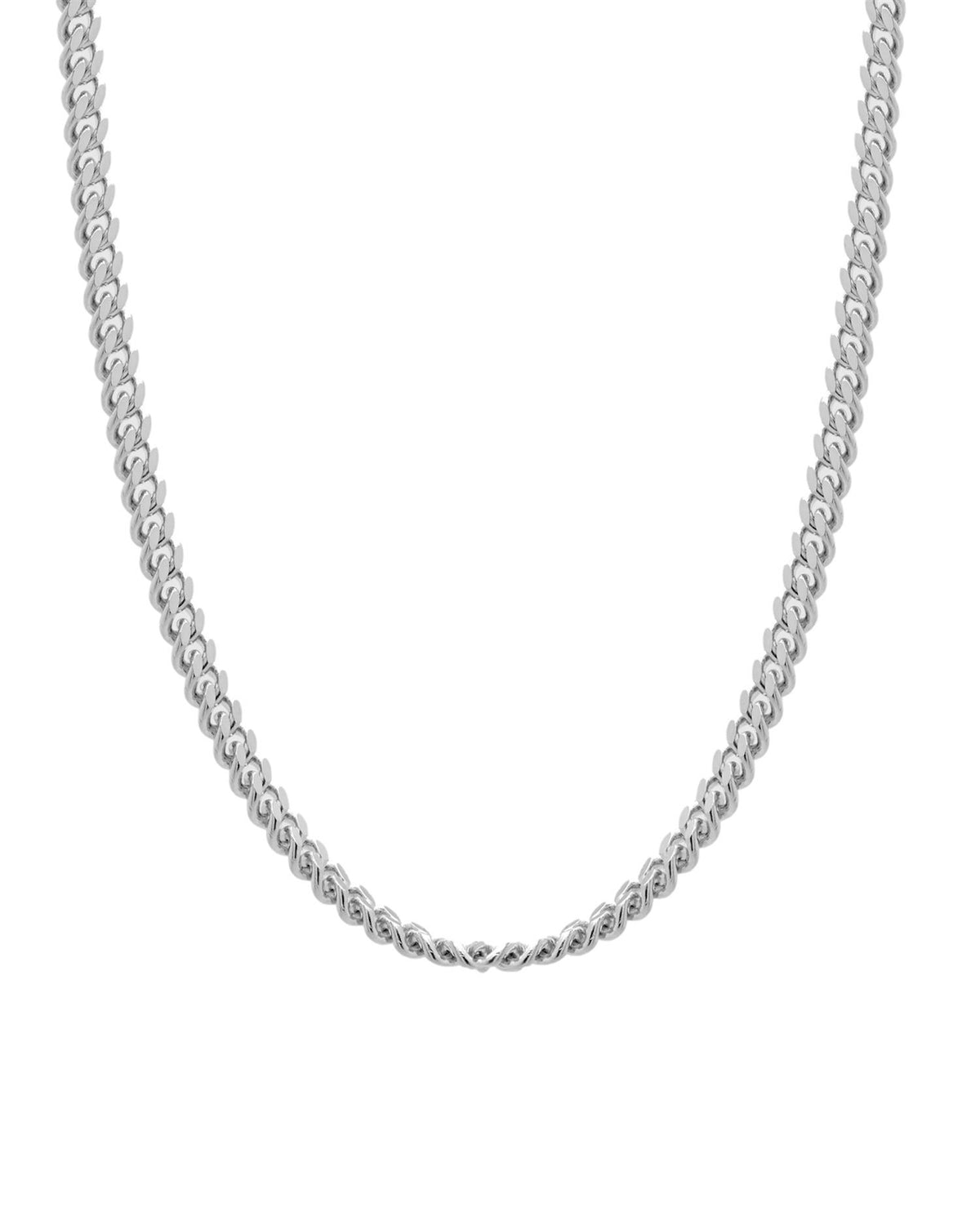 Tom Wood Curb Chain Smykke i sølv, nærbilde av den robuste kjededes detaljer og glans.