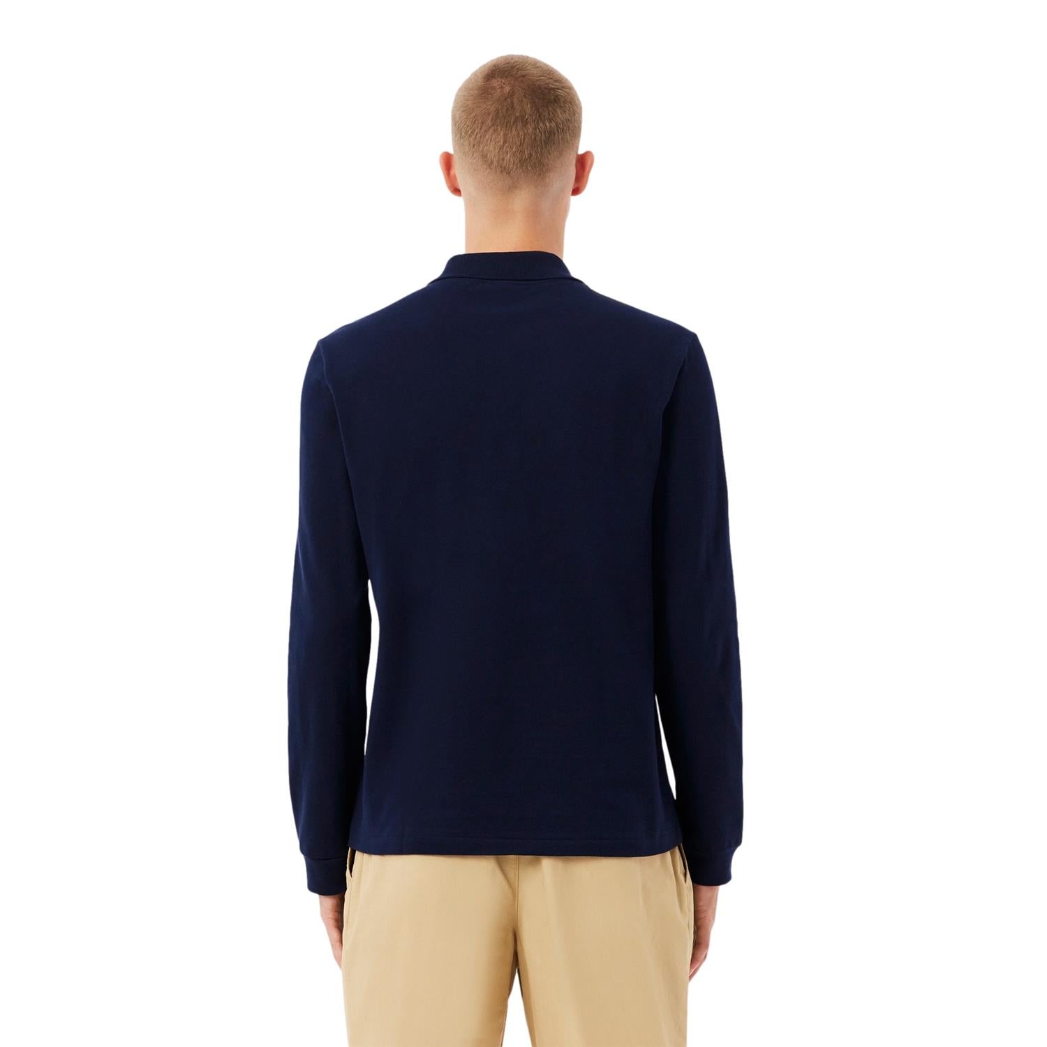 Lacoste langermet polo skjorte i klassisk passform, marineblå, med pikékrage og Crocodile-logo på brystet.