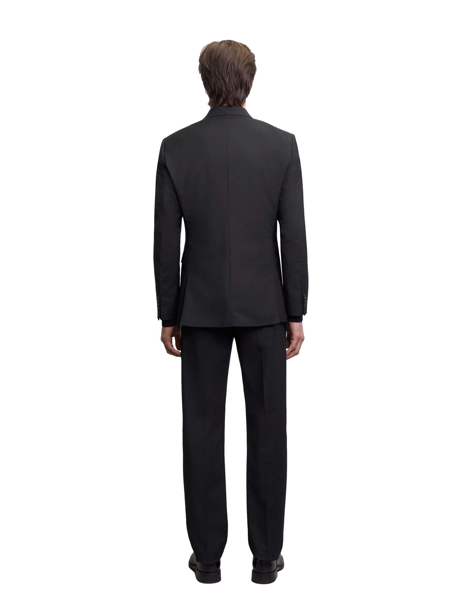 Sort Tiger of Sweden Justins Travel Suit dressjakke, elegant blazer med strukturert stoff og klassisk passform.