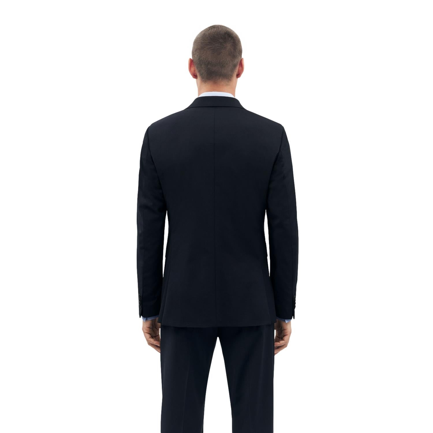 Marineblå Tiger of Sweden Justins Travel dressjakke, stilfull blazer med enkel passform og elegante detaljer.