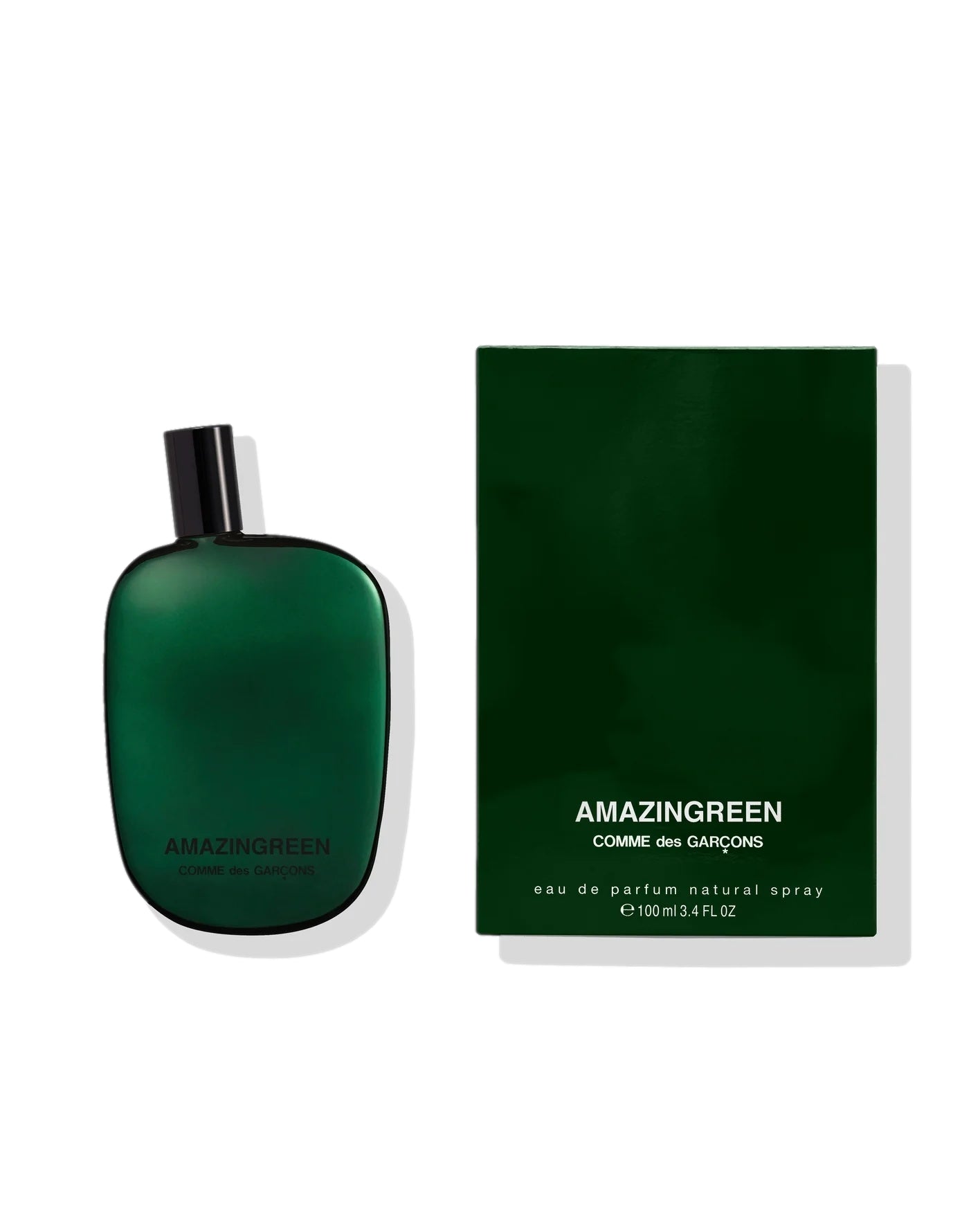 Grønn Comme des Garcons Parfums Amazingreen Eau De Parfum flaske, elegant parfyme med frisk, naturlig duft.