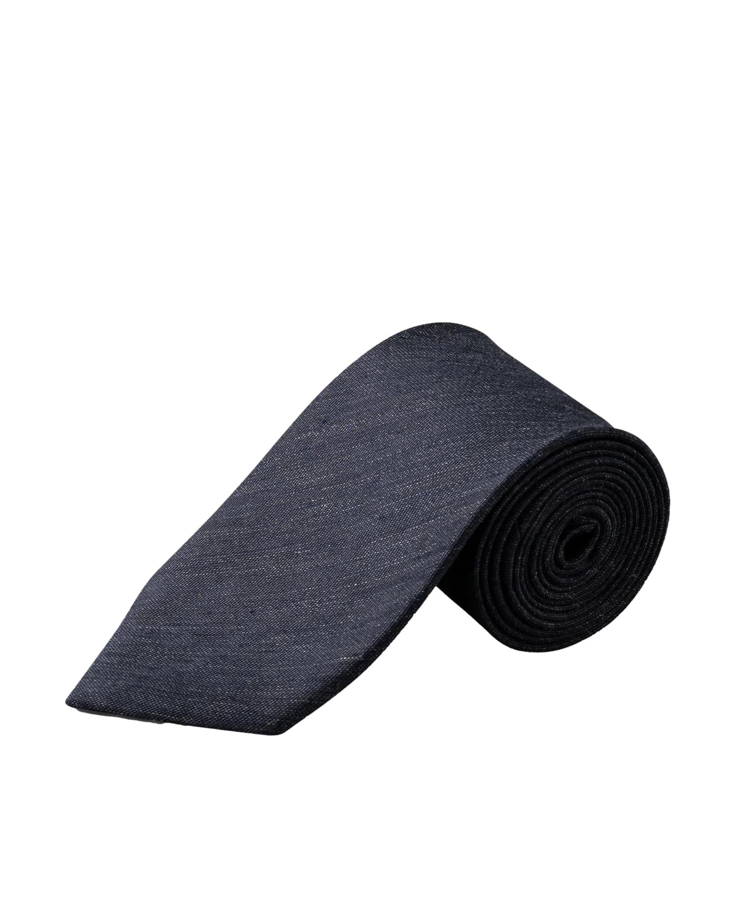 Eton navy blå slips av lin og silke med vevd struktur, perfekt for formelle anledninger, vist på en flat lay.