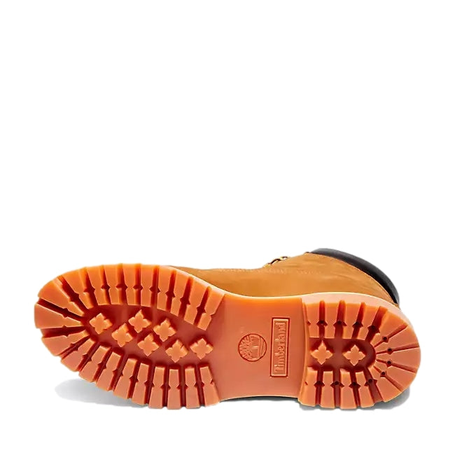 Gul Timberland 6-tommer premium støvel, robuste sko med lærdetaljer og solid såle, vist i bilde.