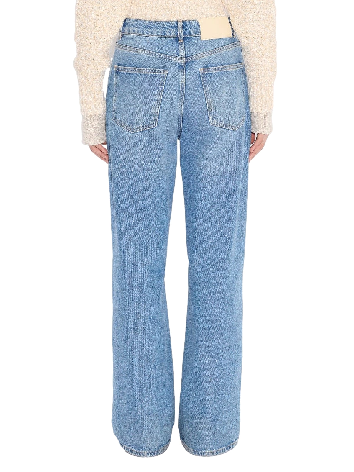Lyseblå Holzweiler W Wide-Leg jeans, stilfulle bukser med vid passform, vist på modell.