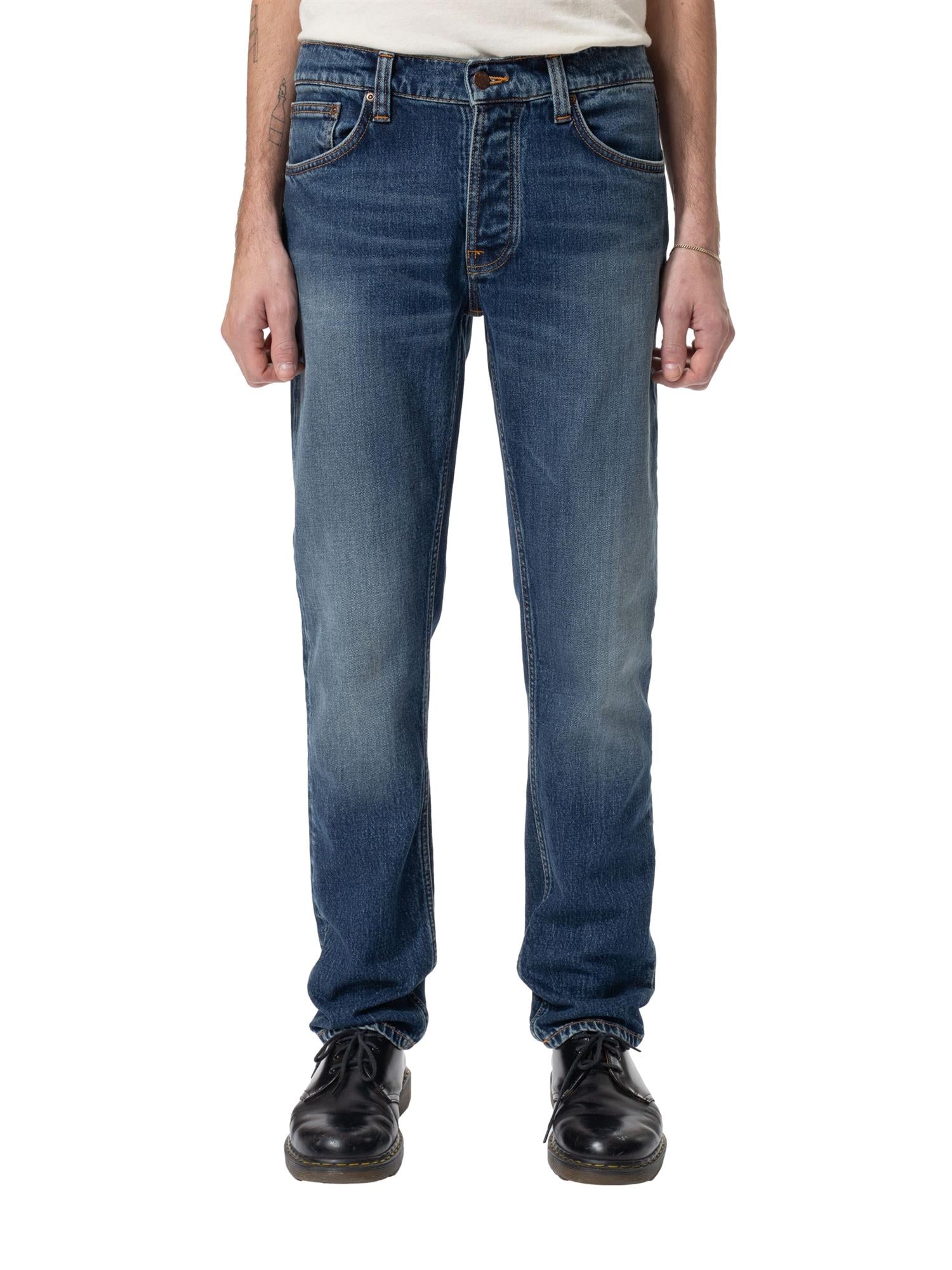 Mørkeblå Nudie Jeans Ollie Wild Blue jeans av bomull, vises med klassisk passform og slitestyrke.