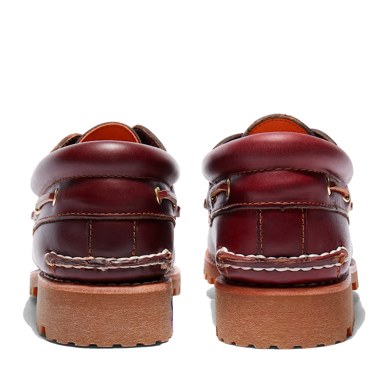 Burgunder Timberland Authentic 3-Eye Lug Boat Shoe foran med lær og gummisåle, detaljert visning av skoens design.