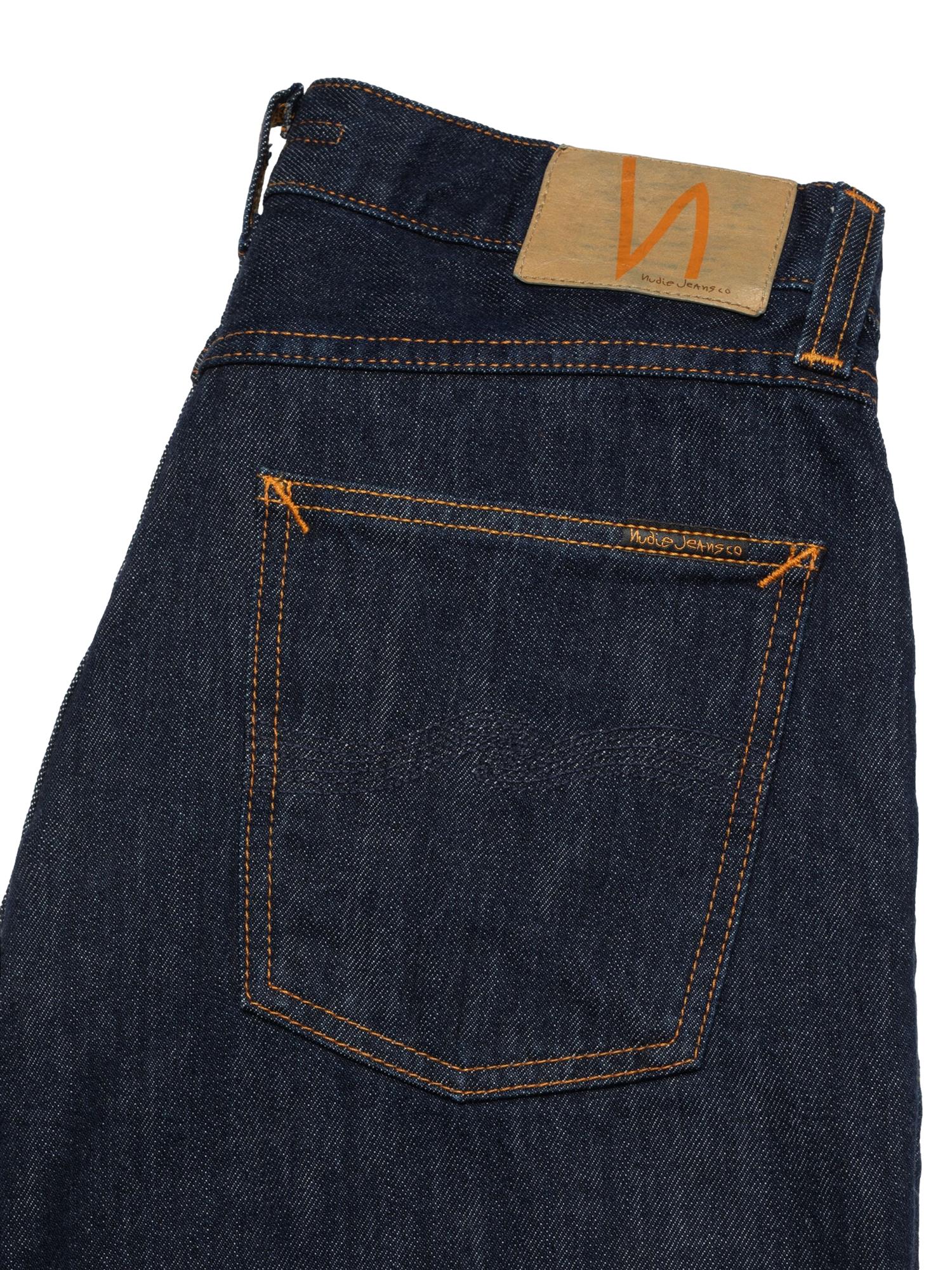 Nudie Jeans Rad Rufus blå jeans i denim, vises på bildet. Klassisk slim fit med lett slitasje og faded effekt.