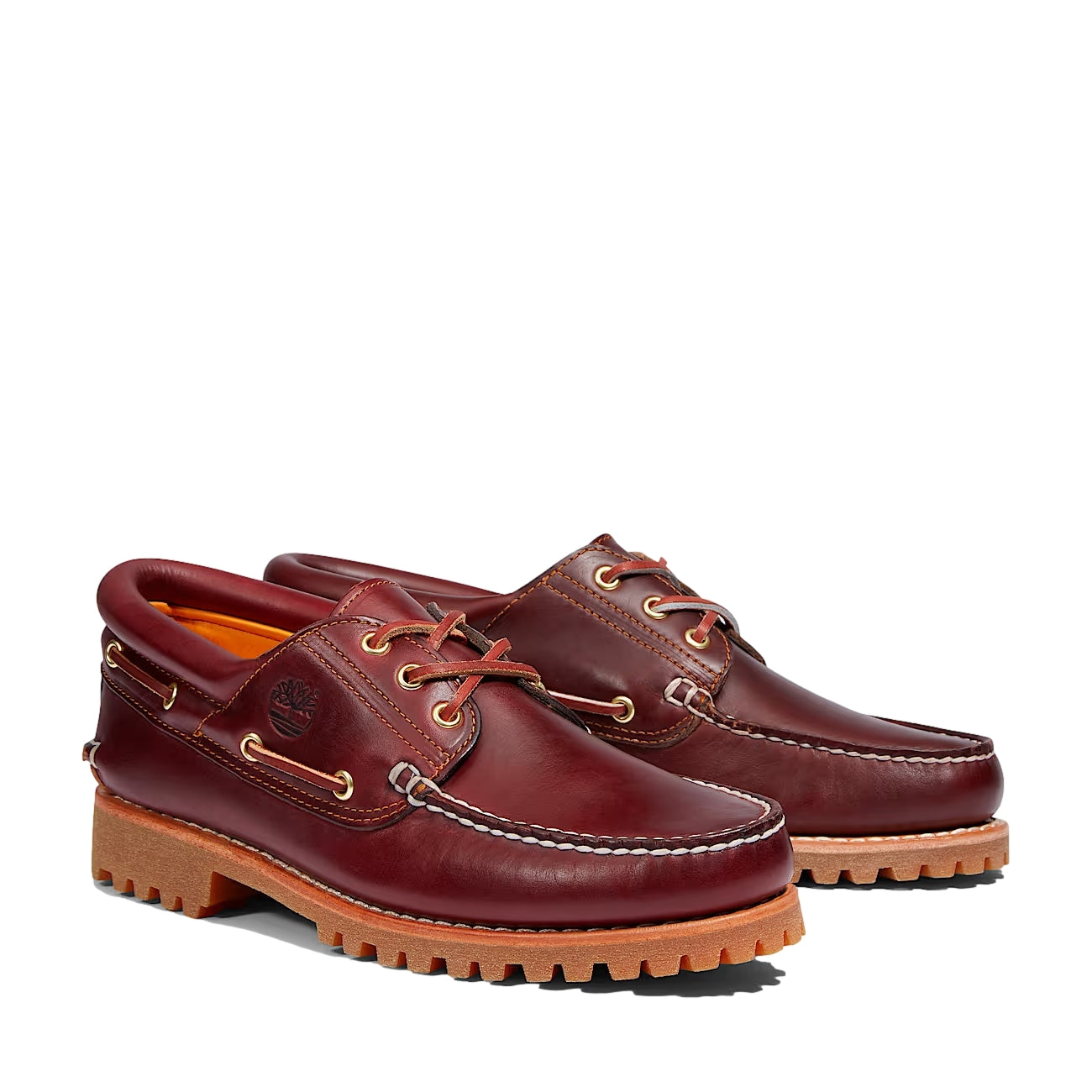 Burgunder Timberland Authentisk 3-Eye Lug båt sko i lær med hvite såler og synlige sømmer.