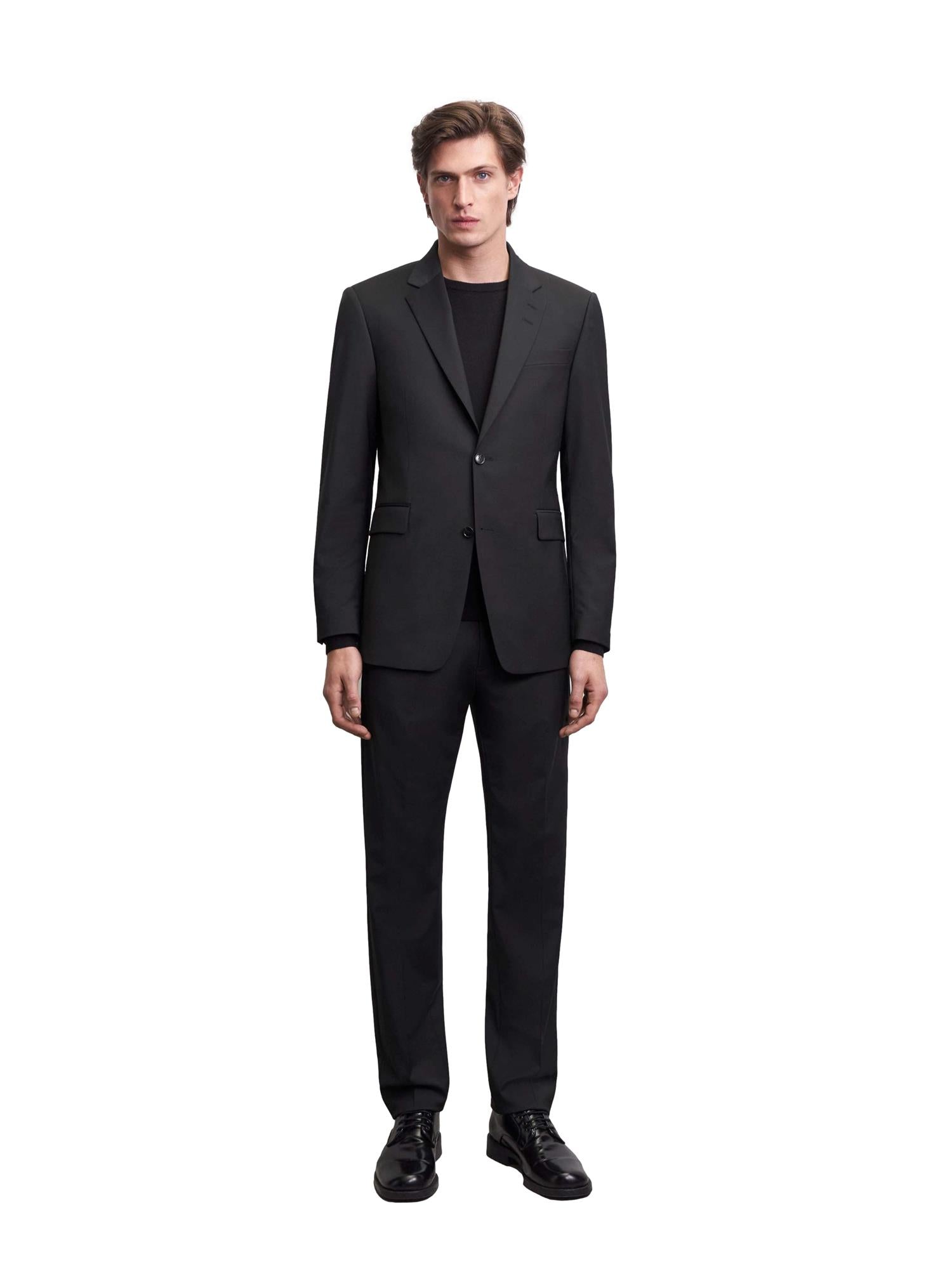 Sort Tiger of Sweden Justins Travel Suit blazer dressjakke med elegant snitt og fin passform, perfekt til formelle anledninger.