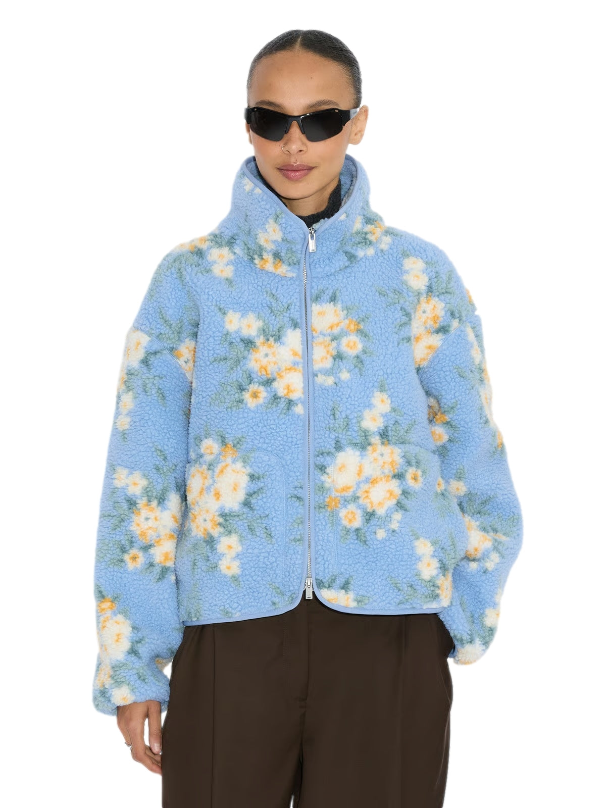 Holzweiler Rype fleecejakke i blått med mønster, vises som en komfortabel og stilig jakke i bilde.