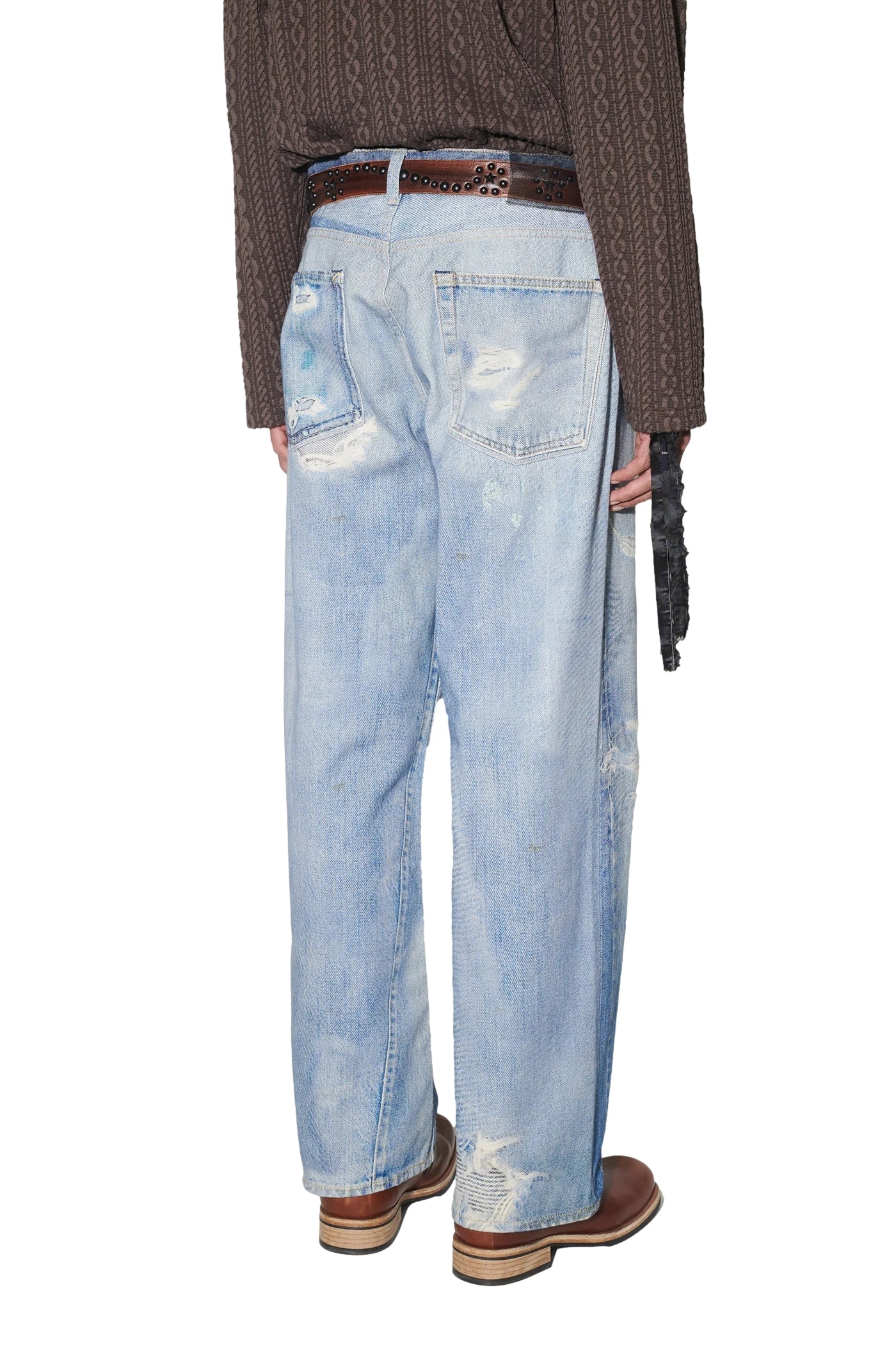 Blå Our Legacy Third Cut jeans med klassisk passform og slitesterkt denim, vist fra siden.
