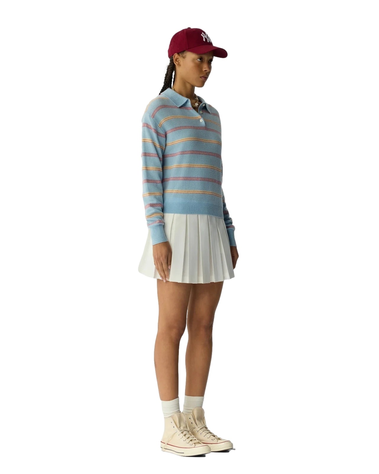 Guest In Residence collegiate stripe polo genser i blå med mønster, vises med krage og stripemønster på bildet.