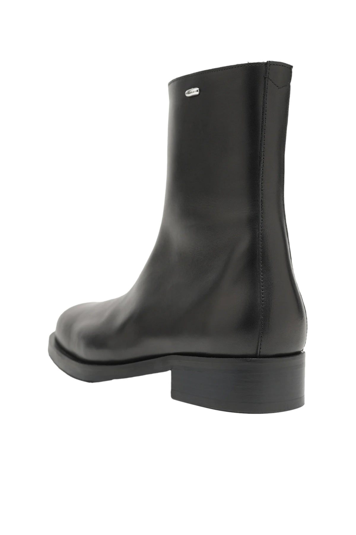 Sort Our Legacy Camion Boot sko vist i bilde med lærrem og robuste design, perfekt for uformelle antrekk.