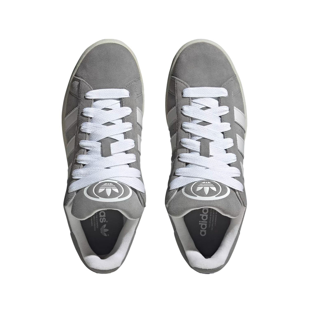 Adidas Campus 00s sko i hvitt og grått med hvit såle og komfortabel design, perfekt for hverdagsbruk.