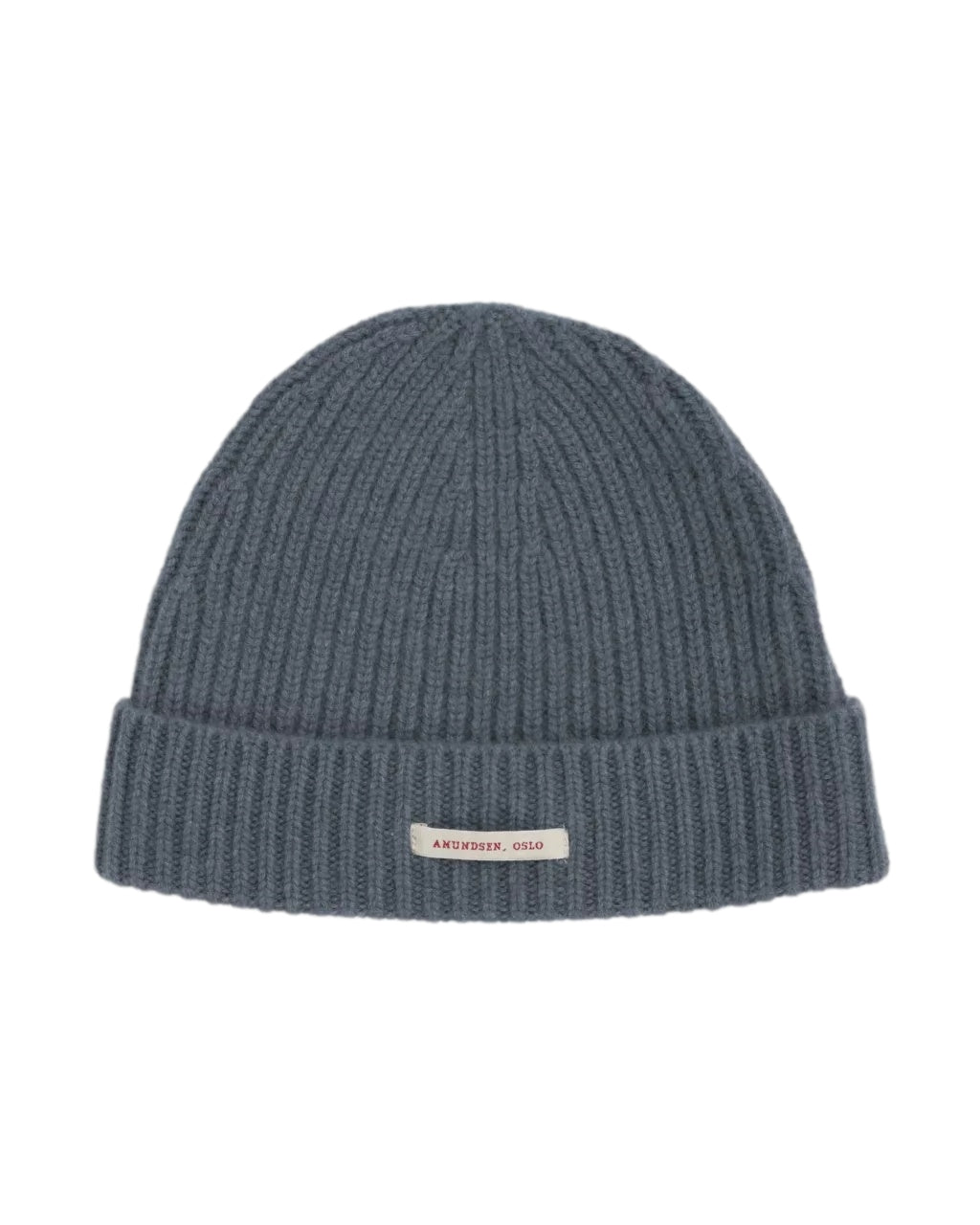 Blå Amundsen cashmere lue, myk og varm beanie i myk cashmere, vist på et bilde.