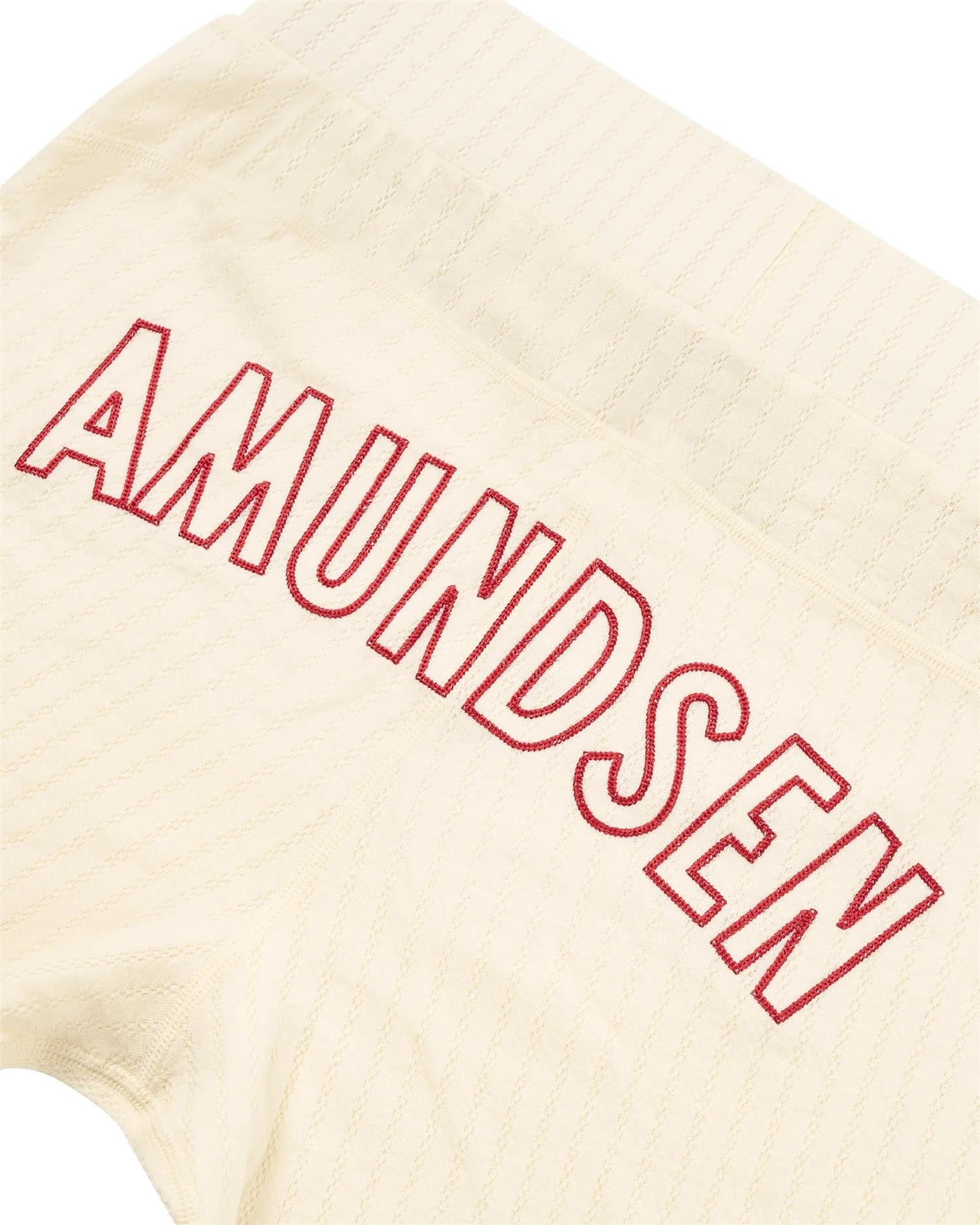 Amundsen Hero's Hide Long Janes ullundertøy for kvinner i off-white, komfortabel og varm baseplagg i mykt ullstoff.