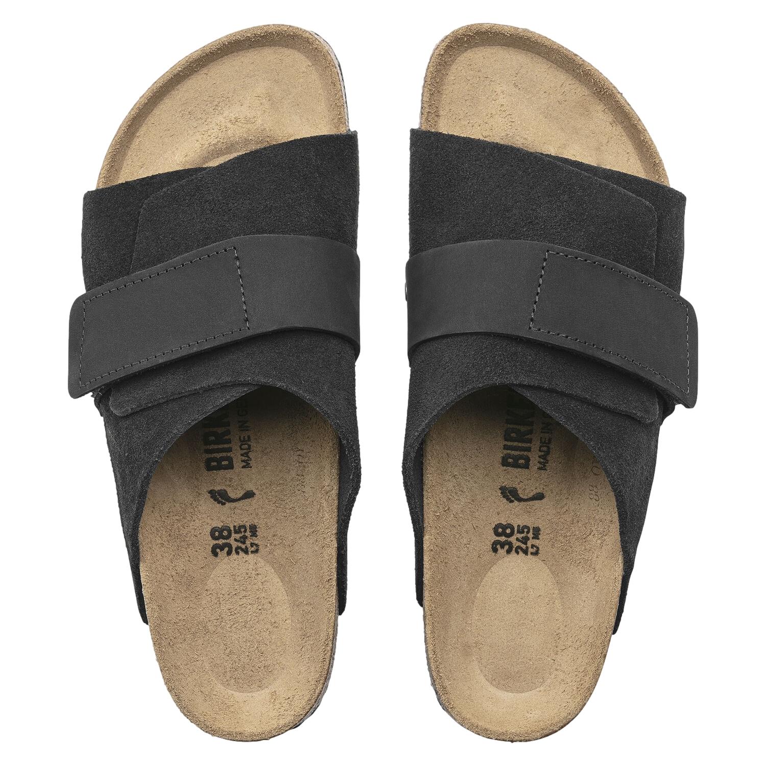 Birkenstock Kyoto nubuck og semsket skinnsko i sort, komfortable og stilige med regulær passform, vist fra siden.