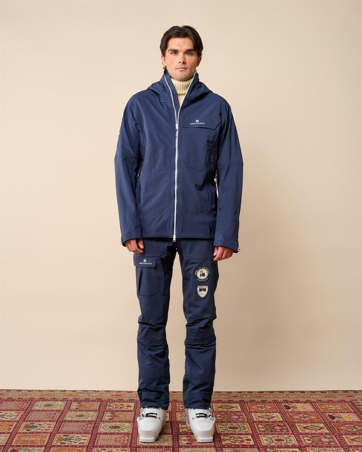 Amundsen Peak Jacket herre i stormy blått, turkis, utendørsjakke med glidelås og hette, men uten modell.