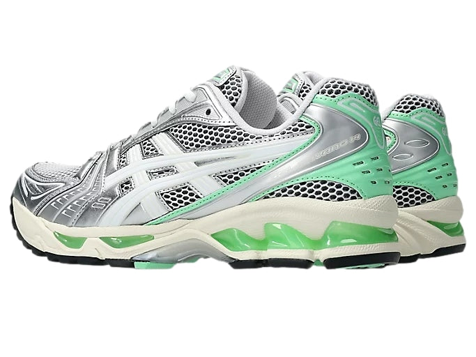 Asics Gel-Kayano 14 joggesko i hvit og grønn, vises med hvit såle og mentholgrønn detaljer, sportssko for løping.