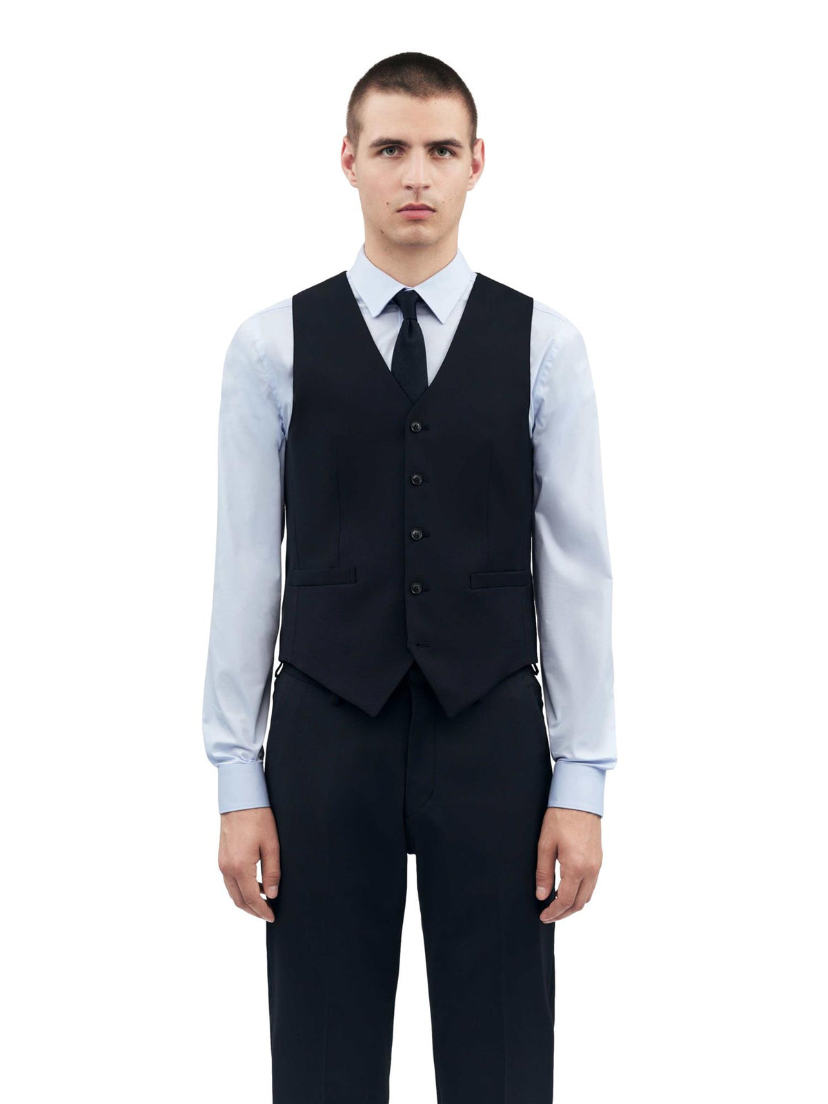 Marine Tiger of Sweden Wayde reisevest, klassisk vest i skinn med knappestolpe og lommer, elegant og moderne design.