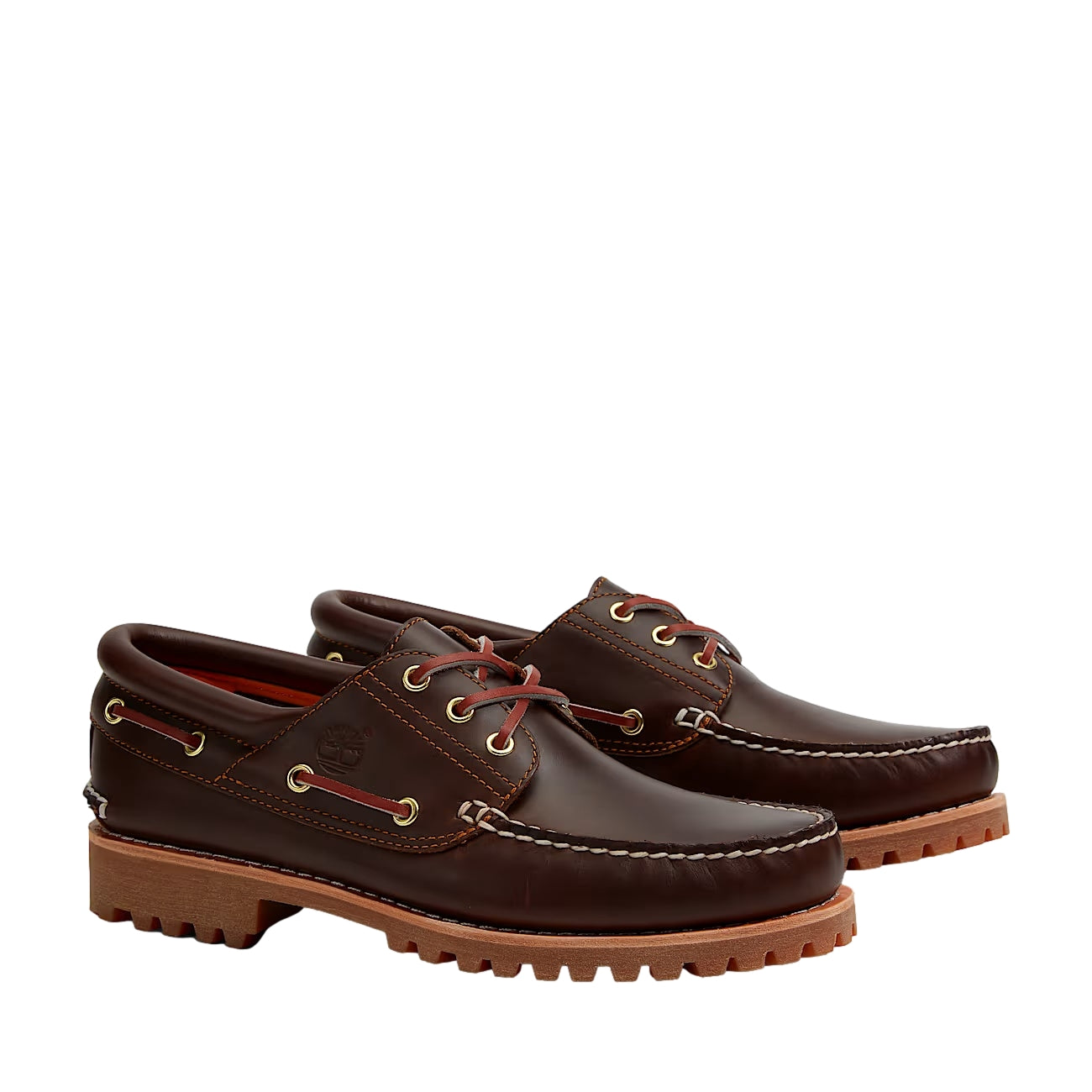 Mørkebrune Timberland Authentic 3-Eye Lug Boat Shoes, komfortable og stilige sko med lærrem og gummisåle, vist i bilde.