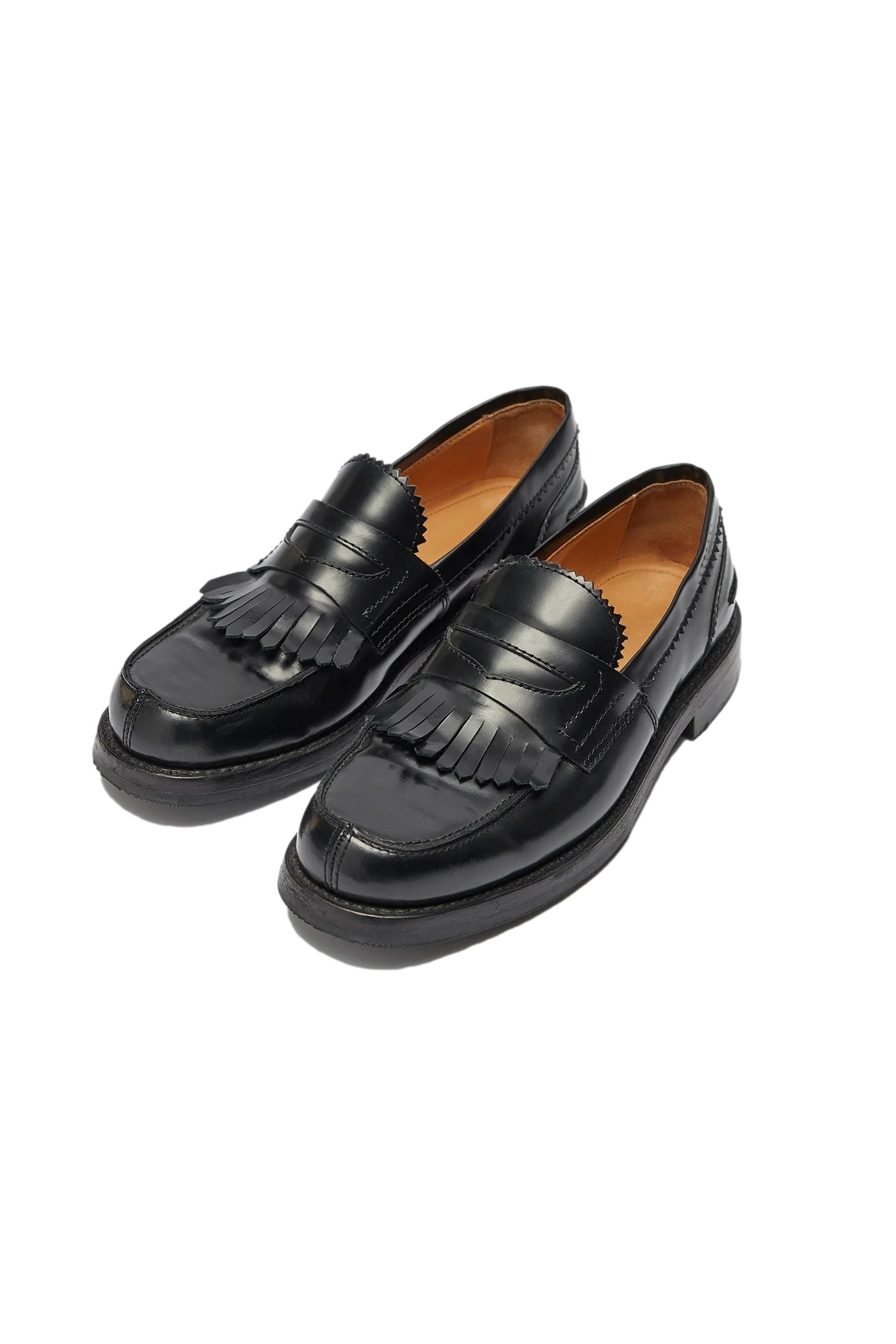 Sort Our Legacy Loafer sko i lær med slank design og komfortabel passform, vist foran på et lyst gulv.