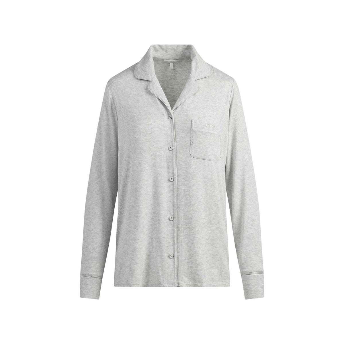 SKIMS sovepysj med langermet knappesett i lys grå Heather Grey, mykt undertøysmateriale, komfortabelt for søvn og avslapning