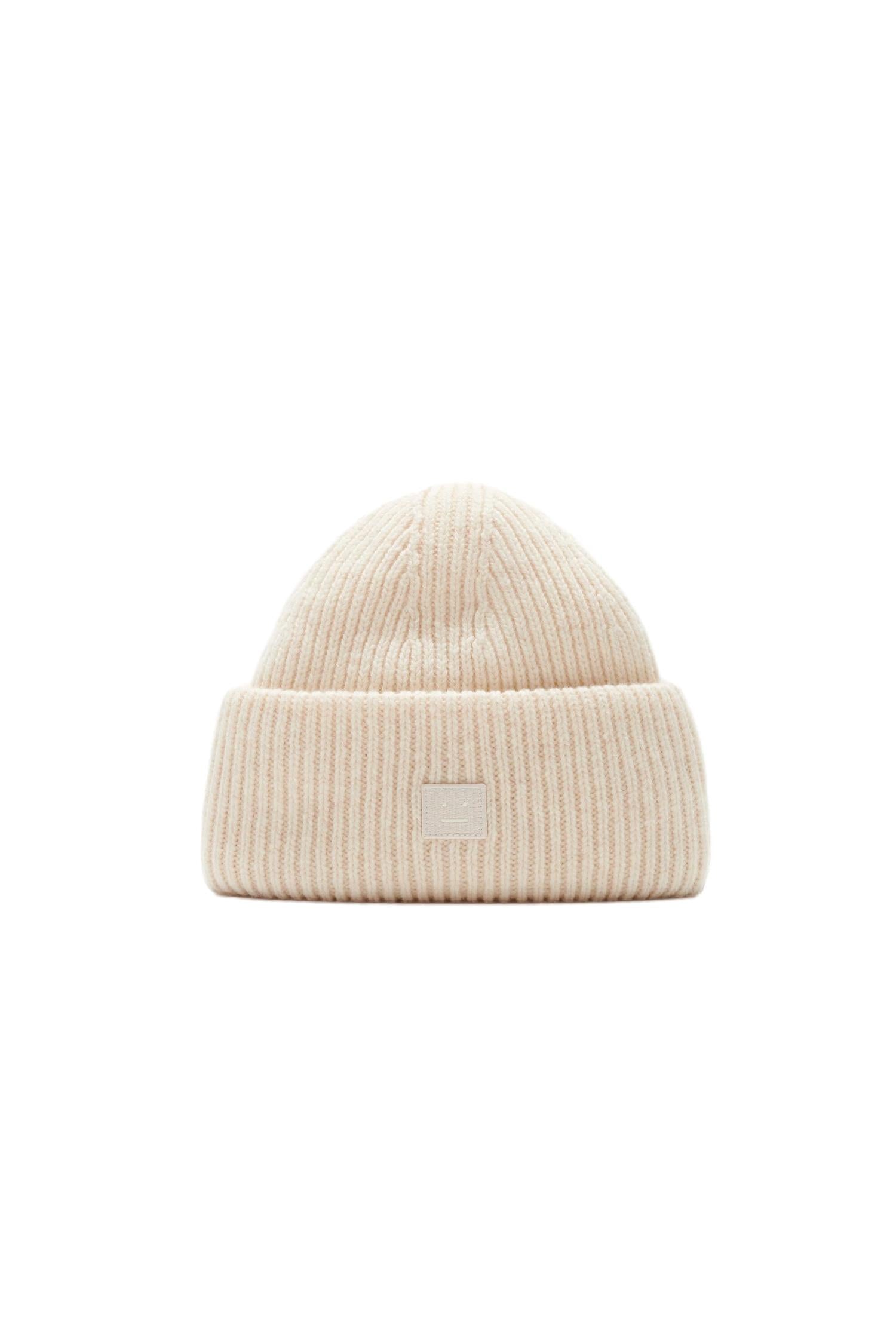 Acne Small face logo beanie Lue Lys Beige - modostore.no