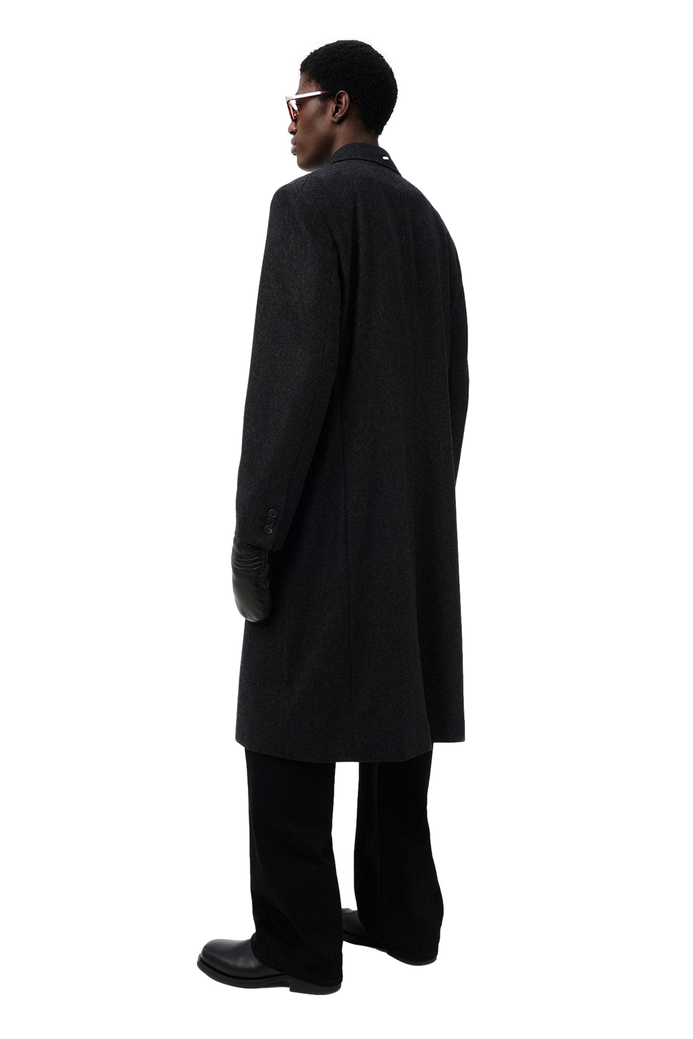 Mørkegrå Our Legacy Whale Coat jakke vist med klassisk design og rund hals, laget av varm, myk stoff.